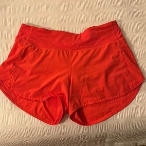 Orange lululemon run speed 4.0
